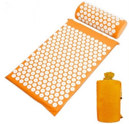 Acupressure mat and pillow set with carrying bag on a white background