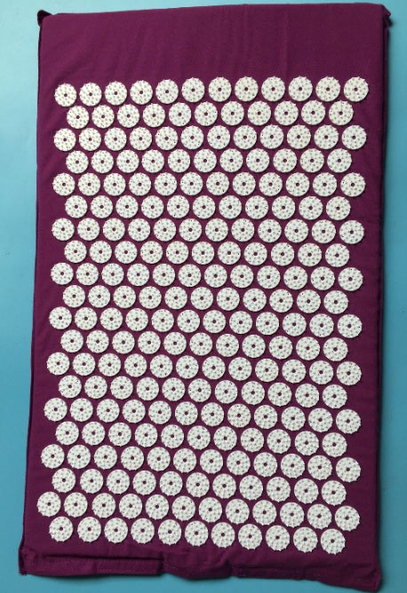 Acupressure mat with white circular nodes on a purple border against a blue background