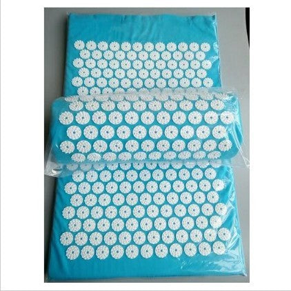 Acupressure mat with white floral patterns on a blue background