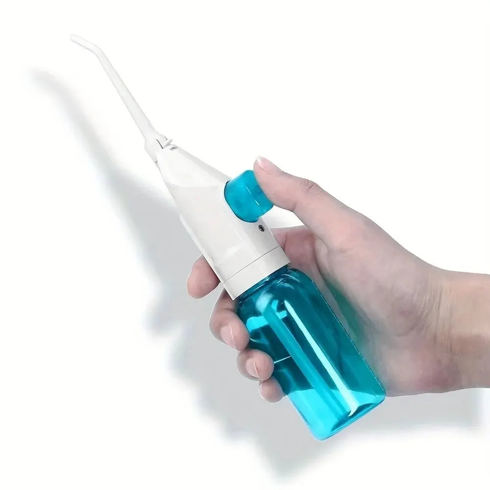 Manual High Pressure Water Flosser – Portable Oral Irrigator Cleaner - The Little Market Shop