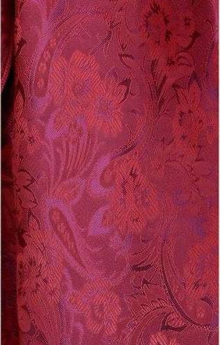 Close-up of red and burgundy paisley pattern on 100% silk scarf